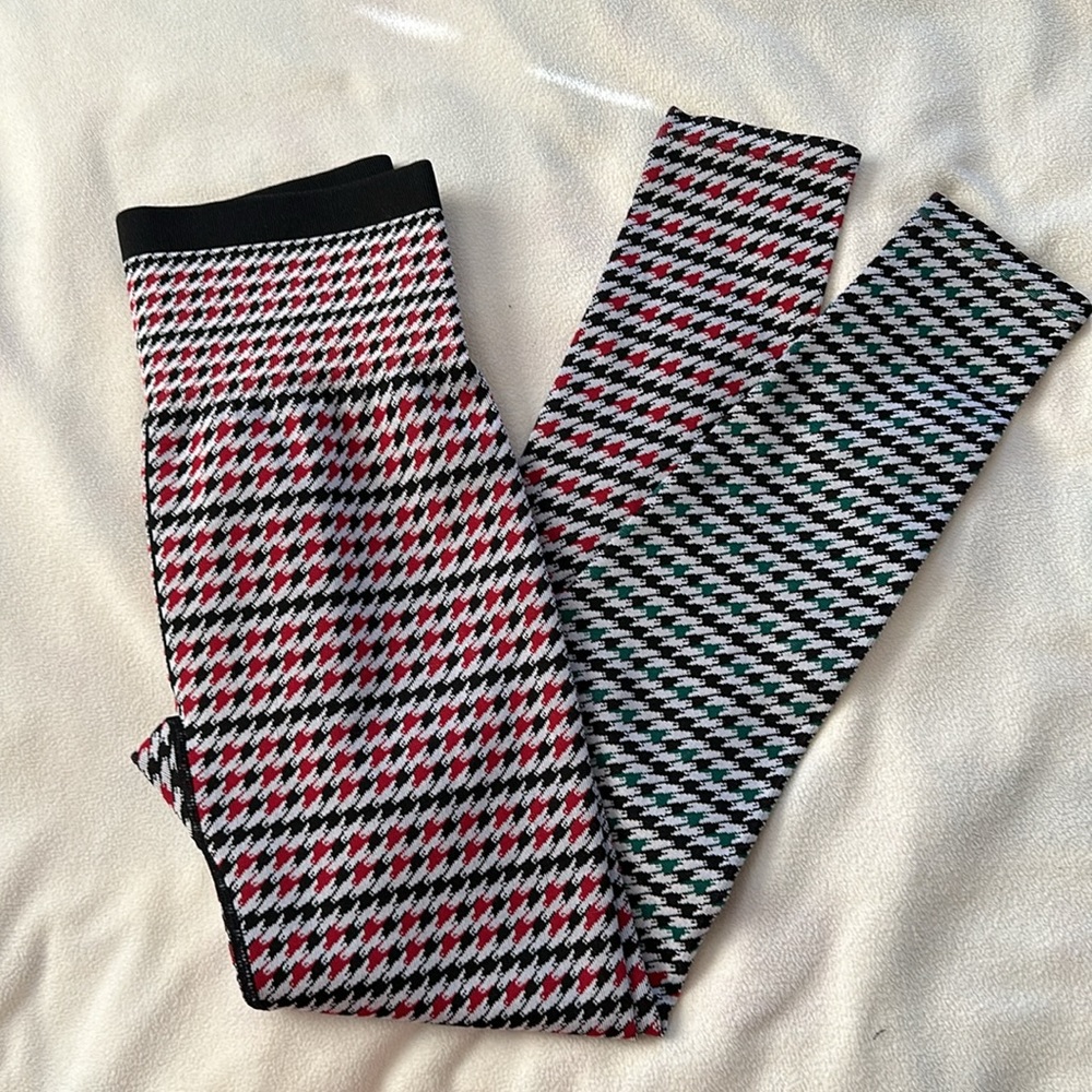 NWOT interesting green, black, red and white Fabletics  leggings  size medium